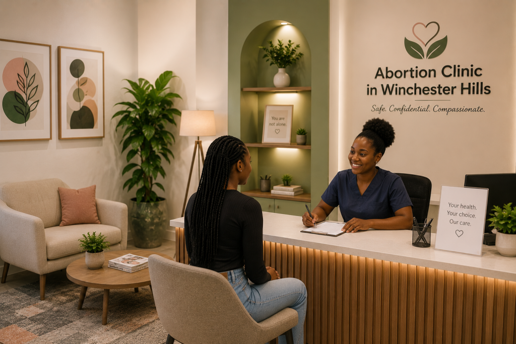 A professional nurse working at abortion clinic in Winchester hills explaining to a young female how to book an appointment.