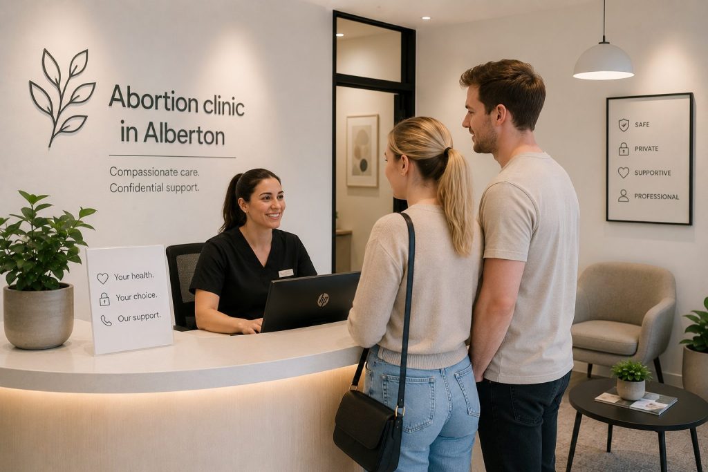 Abortion clinic in Alberton assisting a young couple at a modern healthcare reception in a private and supportive clinical environment.