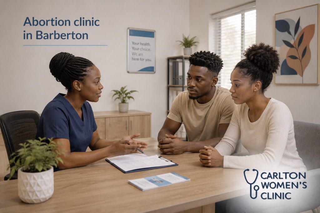 Nurse working at an abortion clinic in Barberton explaining to a young couple how the clinic operates.